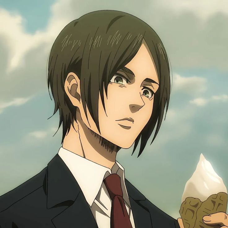 Eren Yeager with shoulder-length unkempt hair during the Marley arc in Attack on Titan